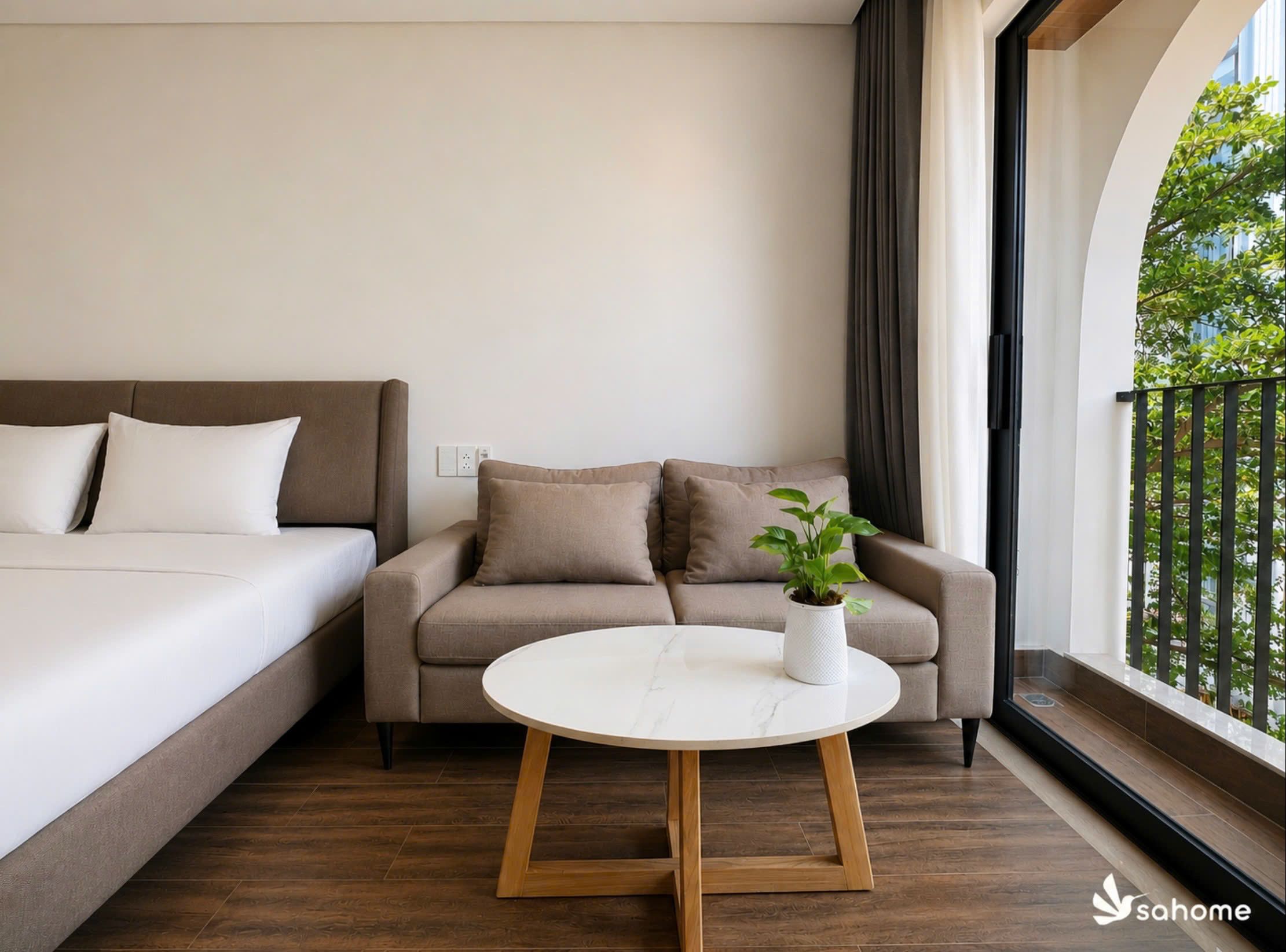 Bedroom and lounge area with a balcony